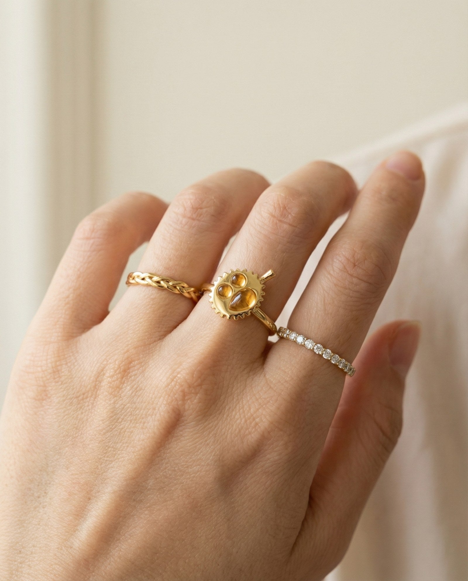 Durian Citrine Ring in yellow gold, worn on a model