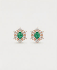 Professional product shot of the Emerald Starflower Studs in 18k rose gold plating over 925 sterling silver.