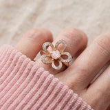 Eternal Rose Shell Ring in rose gold, worn on a model