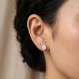 Prism Opal Studs in silver, worn on a model