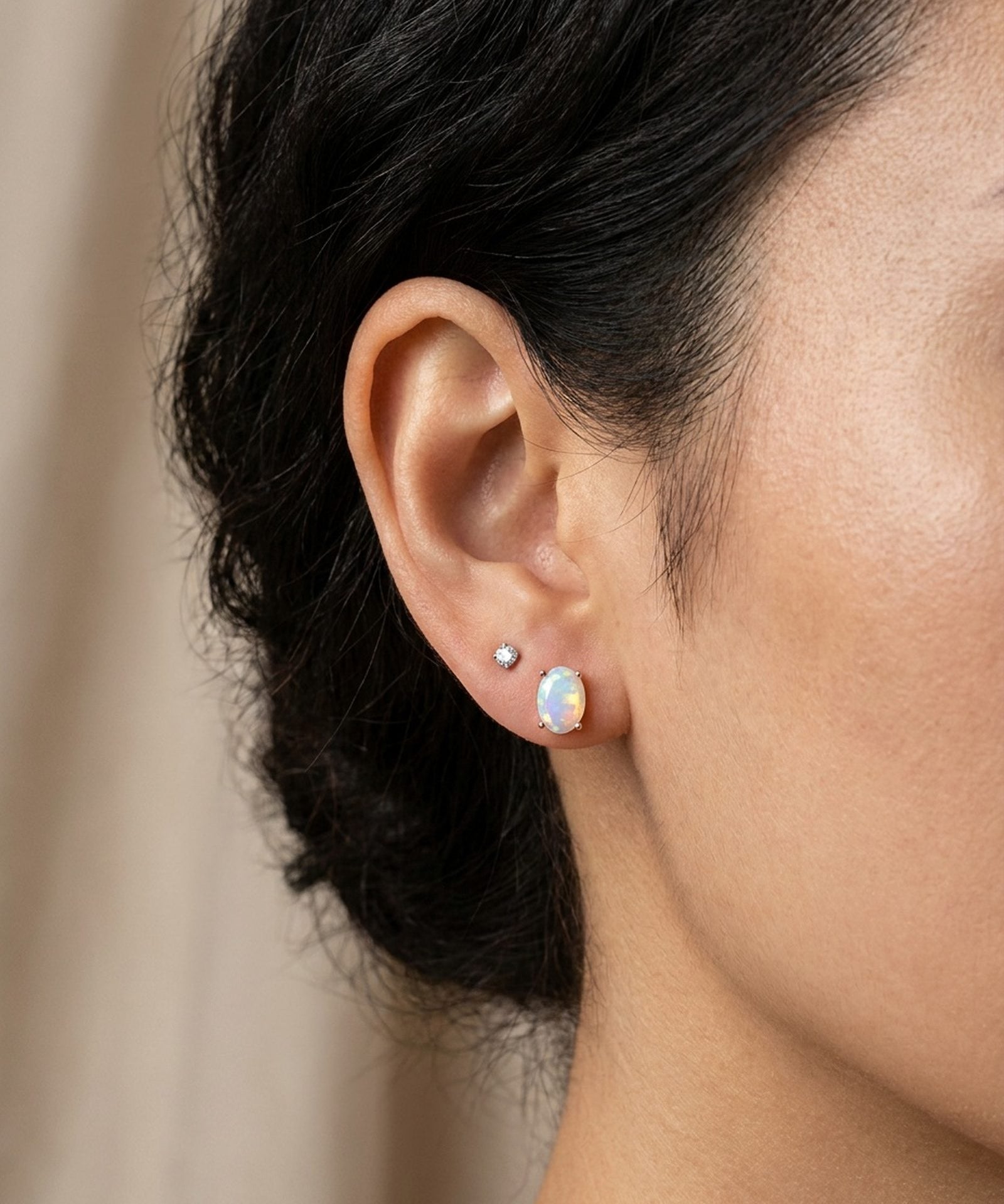 Prism Opal Studs in silver, worn on a model