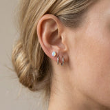 Prism Opal Studs in silver, worn on a model, alternate angle
