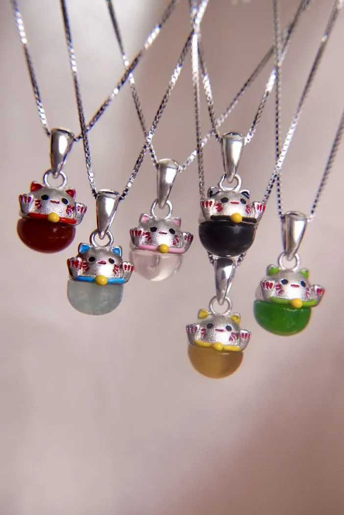 A collection of Fortune Cat Necklaces.