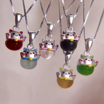 A collection of Fortune Cat Necklaces.