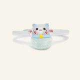 A whimsical Fortune Cat ring crafted in silver, featuring a vibrant blue chalcedony gemstone. The adorable Maneki-neko design symbolizes luck and positivity, perfect for adding charm to any outfit.