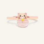 Fortune cat ring crafted in rose gold, featuring a playful cat motif resting on a polished rose quartz gemstone, symbolizing luck and positivity.
