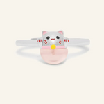 Fortune cat ring crafted in silver, featuring a playful cat motif resting on a polished rose quartz gemstone, symbolizing luck and positivity.