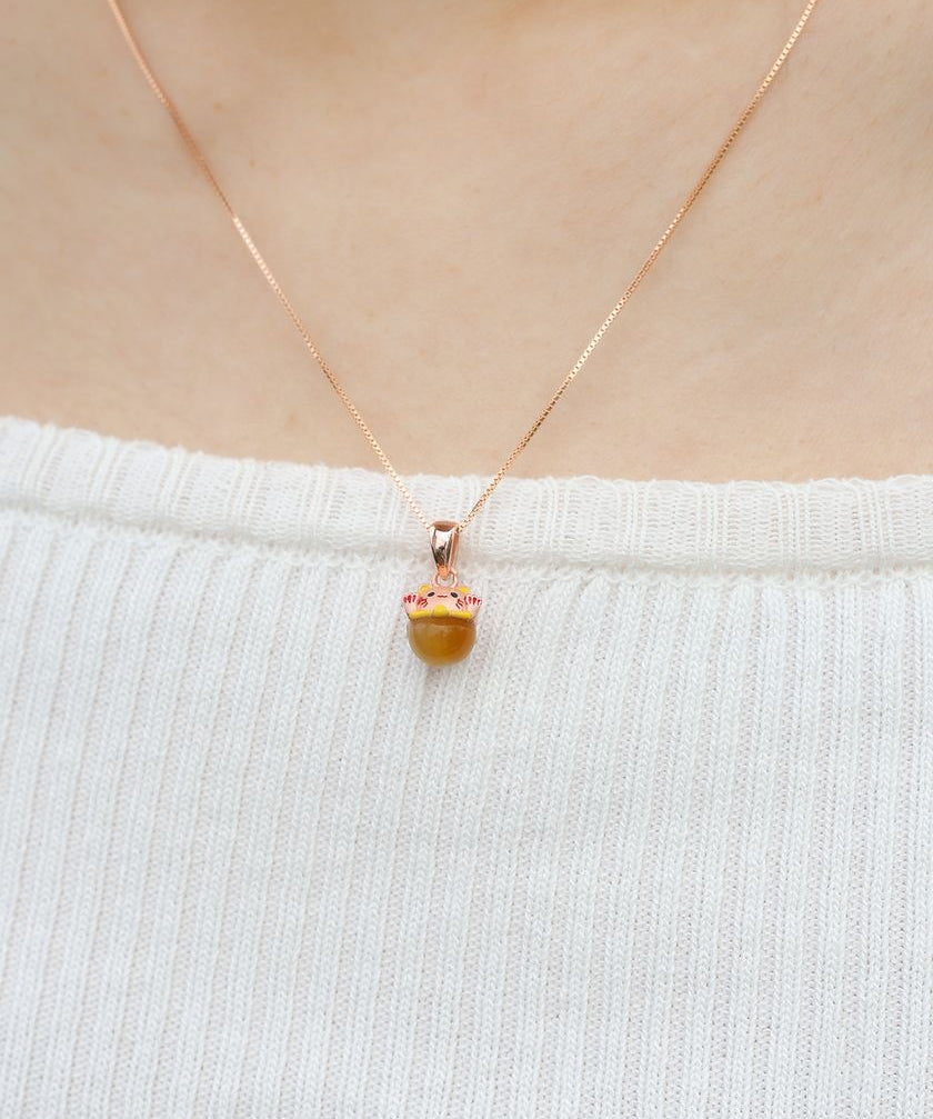Fortune Cat Necklace (Tiger Eye) in rose gold, worn on a model