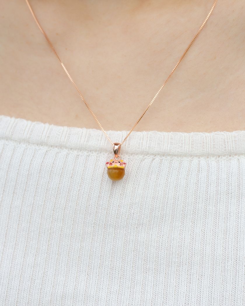 Fortune Cat Necklace (Tiger Eye) in rose gold, worn on a model