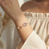 Frosted Snowflake Pearl Bracelet in rose gold, worn on a model