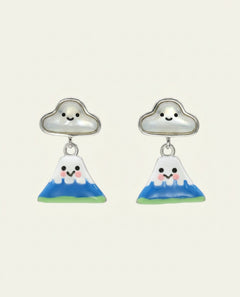 Close-up of the Fuji-San Cloud Mother of Pearl Studs in silver, resting on a warm linen background