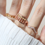 A model wearing the Golden Beads Abacus Ring in rose gold