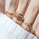 A model wearing the Golden Beads Abacus Ring in rose gold