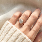 Side angle of the Grand Halo Ring in Rose Gold, demonstrating the classic raised setting and substantial 9mm moissanite depth.