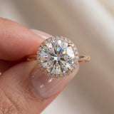 Extreme close-up macro view of Grand Halo Ring in Rose Gold, capturing the high clarity and fire of the 3ct moissanite.