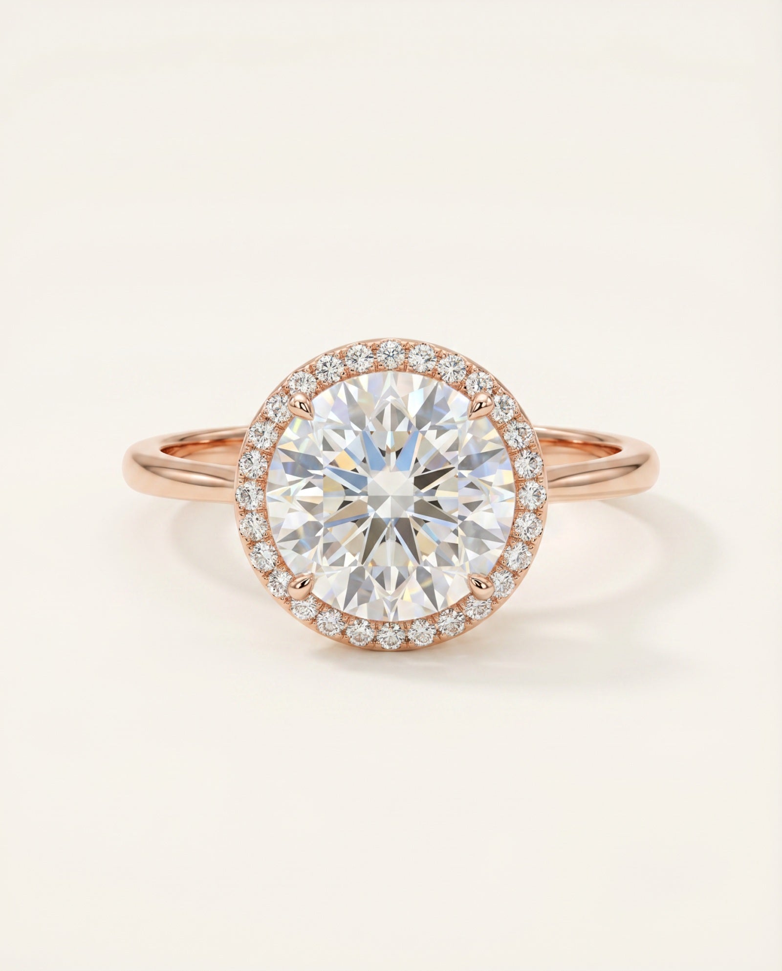 Grand Halo Ring in 18k Rose Gold showing the high-impact brilliance of the 3-carat moissanite and shimmering pavé accents.