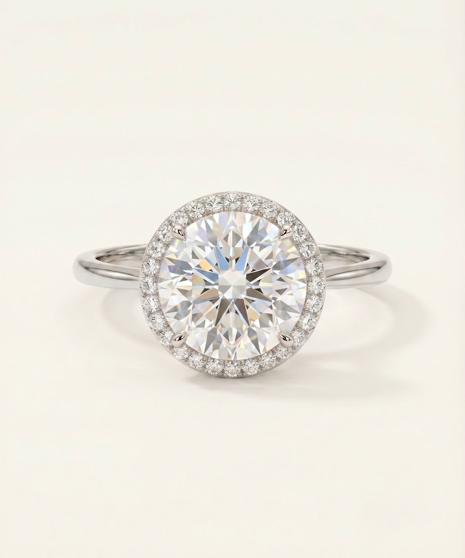 Grand Halo Ring in Rhodium-plated Sterling Silver with a massive 3ct moissanite center and timeless halo design.