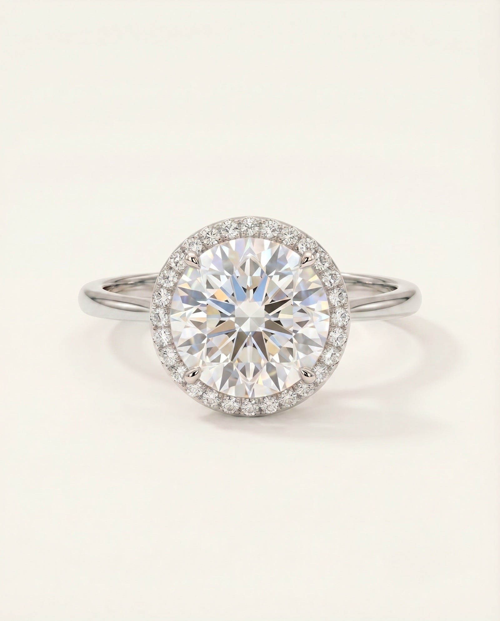 Grand Halo Ring in Rhodium-plated Sterling Silver with a massive 3ct moissanite center and timeless halo design.