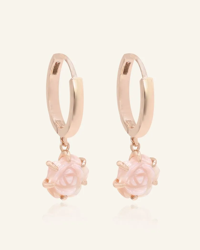 Elegant hand-carved pink shell rose huggies in rose gold, featuring delicate floral craftsmanship for a timeless and romantic look.