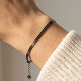Herringbone Bracelet | Elate in black gold, worn on a model