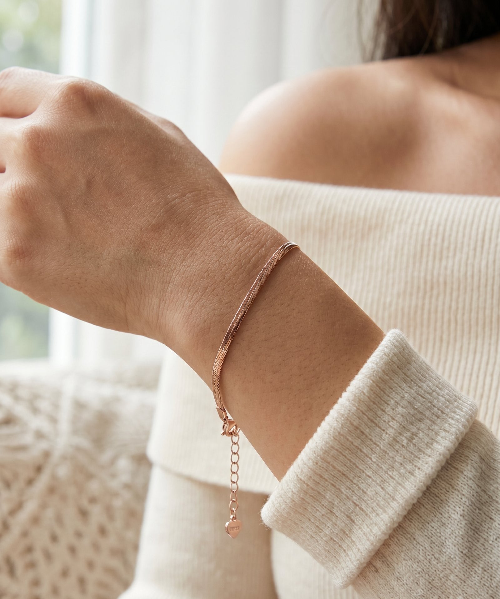 Herringbone Bracelet | Elate in rose gold, worn on a model