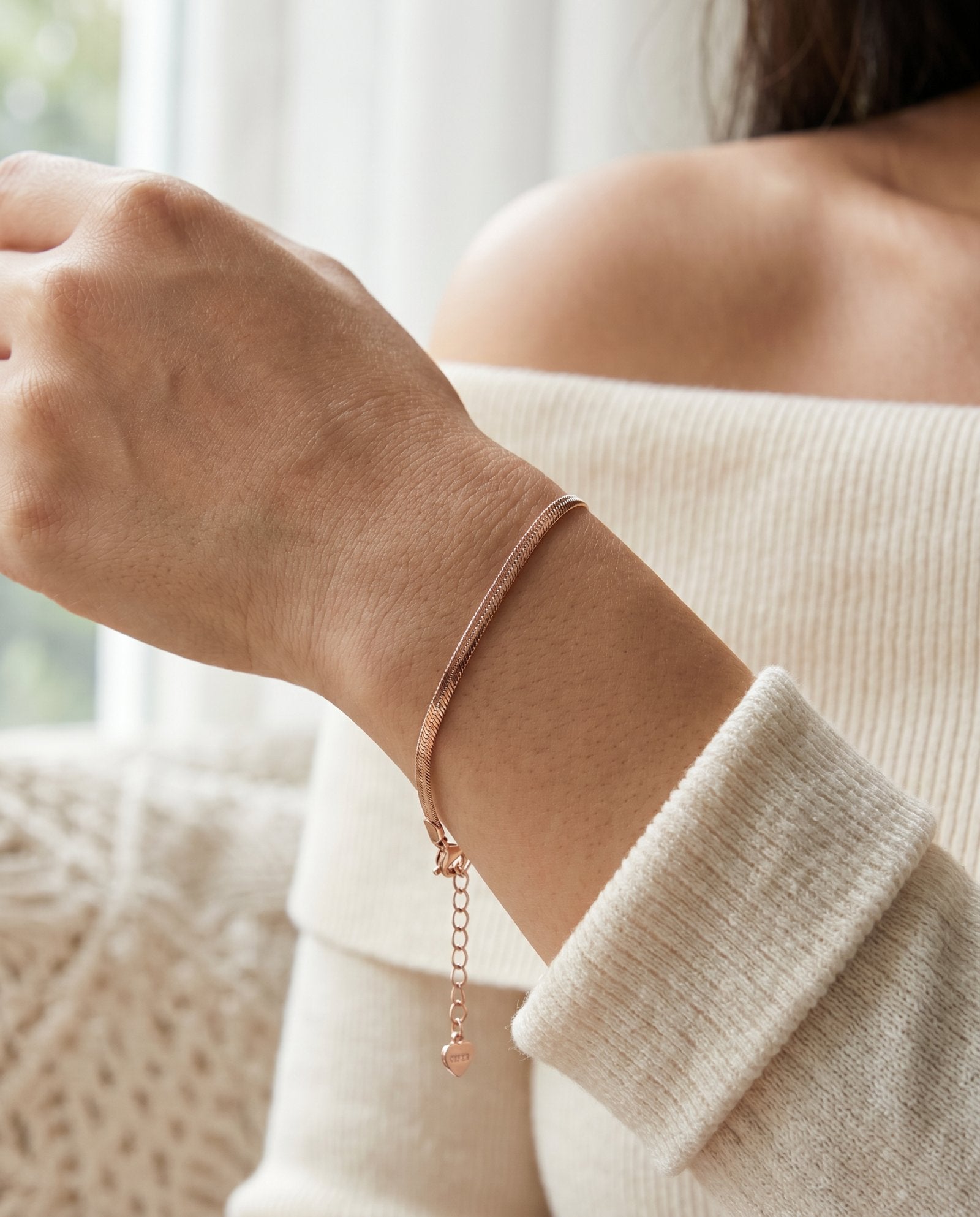 Herringbone Bracelet | Elate in rose gold, worn on a model