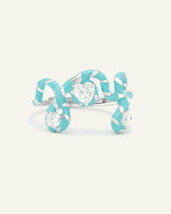 Candy Cane Joy Ring, resting on a warm linen background