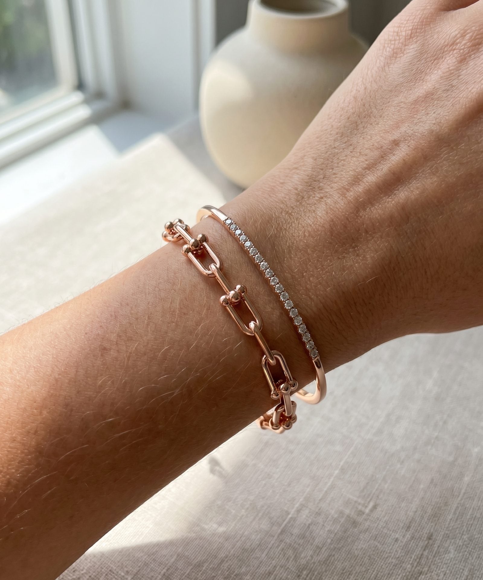 Lock Link Bracelet | Elate in rose gold, worn on a model, stacked