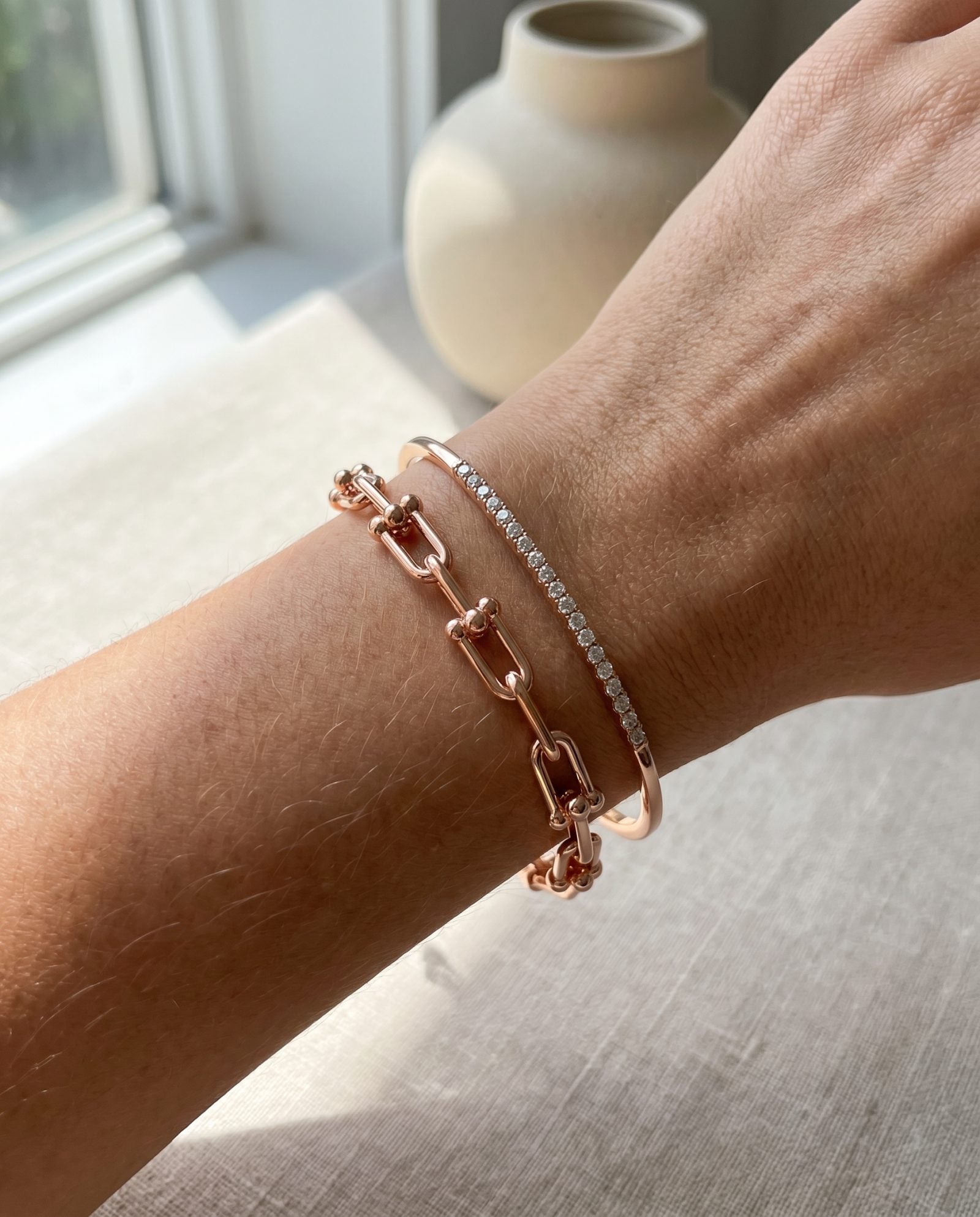Lock Link Bracelet | Elate in rose gold, worn on a model, stacked