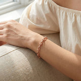 Lock Link Bracelet | Elate in rose gold, worn on a model