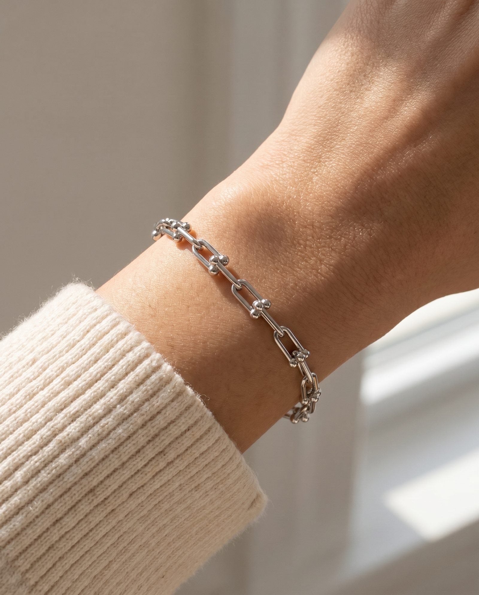 Lock Link Bracelet | Elate in silver, worn on a model