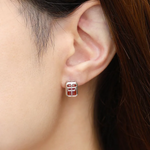A model wearing the red agate mahjong stud.