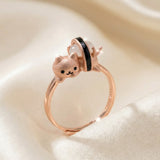 Maki Meow Sushi Ring | White Jade in rose gold, laid flat on a tabletop