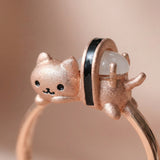 Maki Meow Sushi Ring | White Jade in rose gold, laid flat on a tabletop