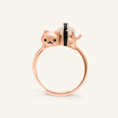 Maki Meow Sushi Ring | White Jade in rose gold, resting on a warm linen background