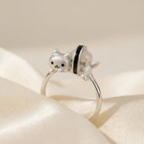 Maki Meow Sushi Ring | White Jade in silver, laid flat on a tabletop