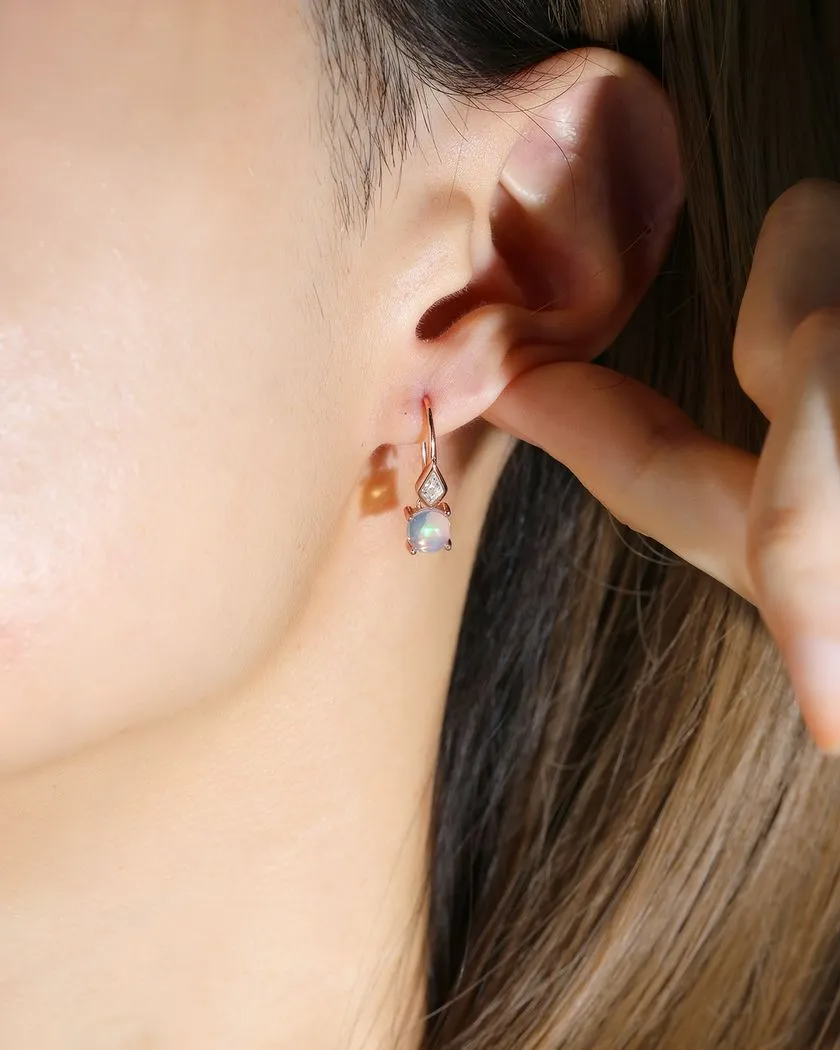 natural opal earring hooks in rose gold on model