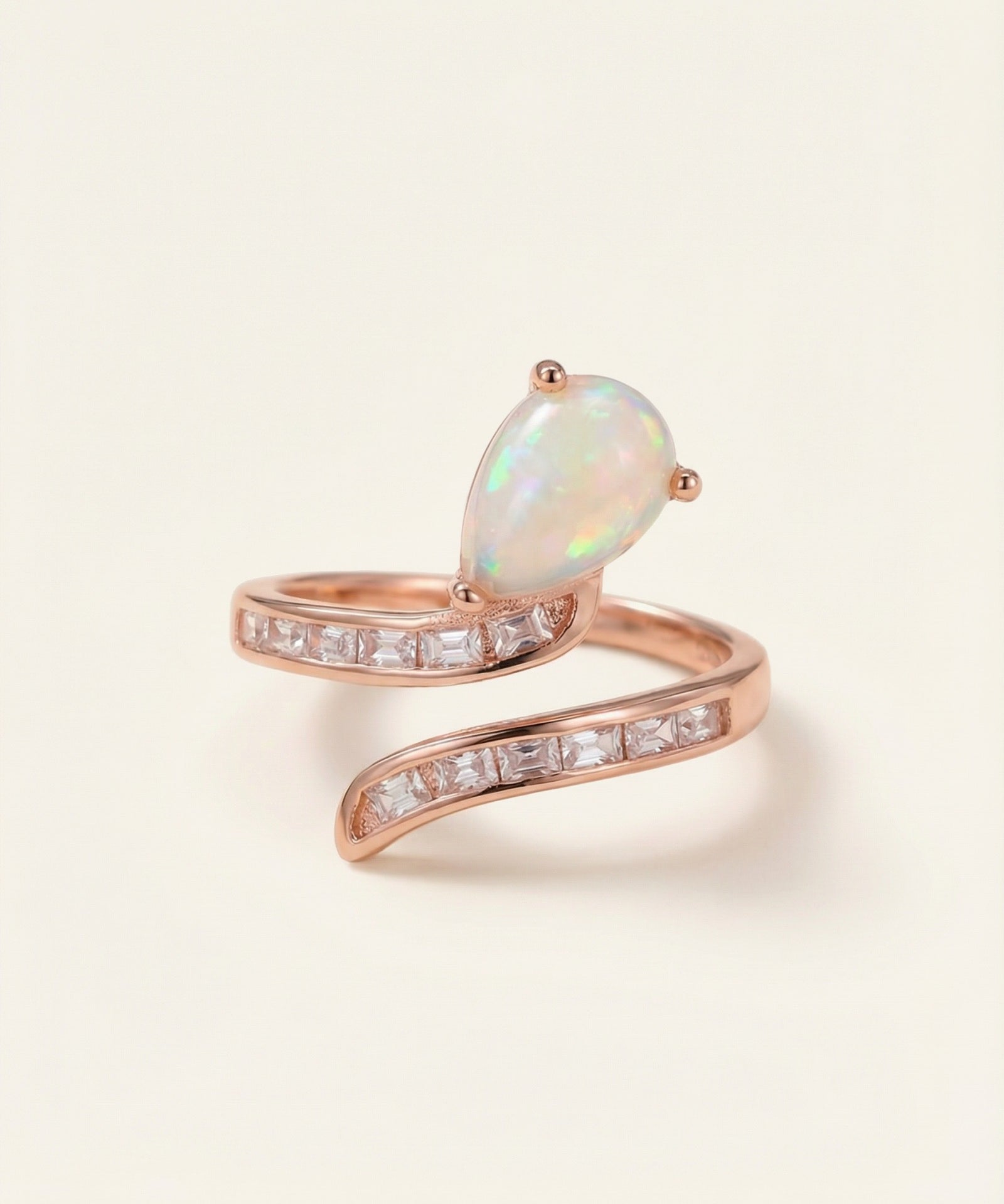 Opal Serpentine Ring with pear-cut natural opal and baguette stones in 18k Rose Gold over 925 Silver