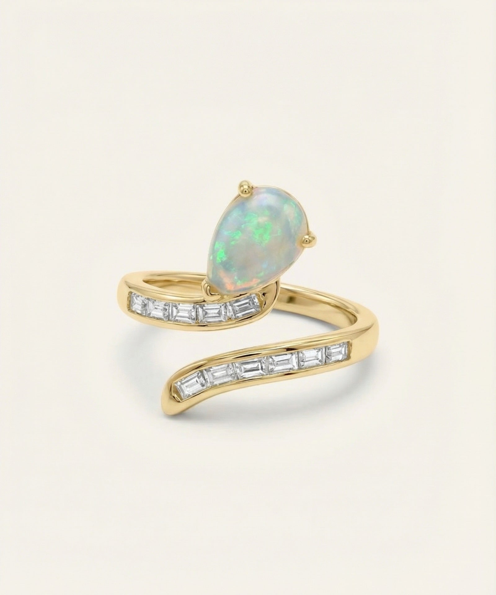 Opal Serpentine Ring with pear-cut natural opal and baguette stones in 18k Yellow Gold over 925 Silver