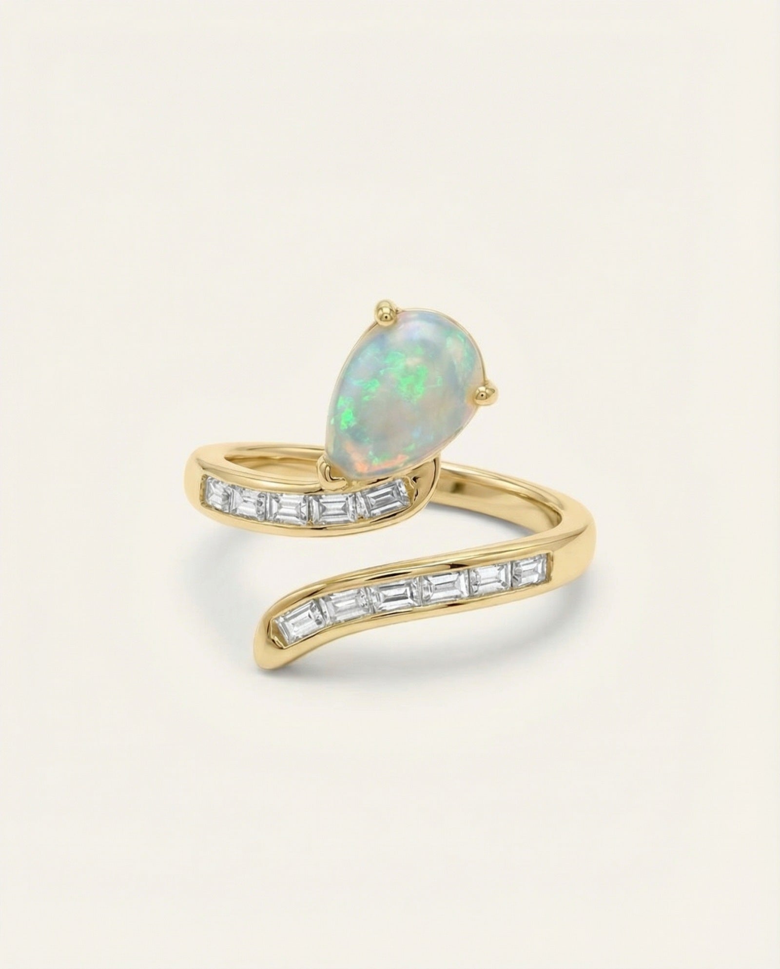 Opal Serpentine Ring with pear-cut natural opal and baguette stones in 18k Yellow Gold over 925 Silver