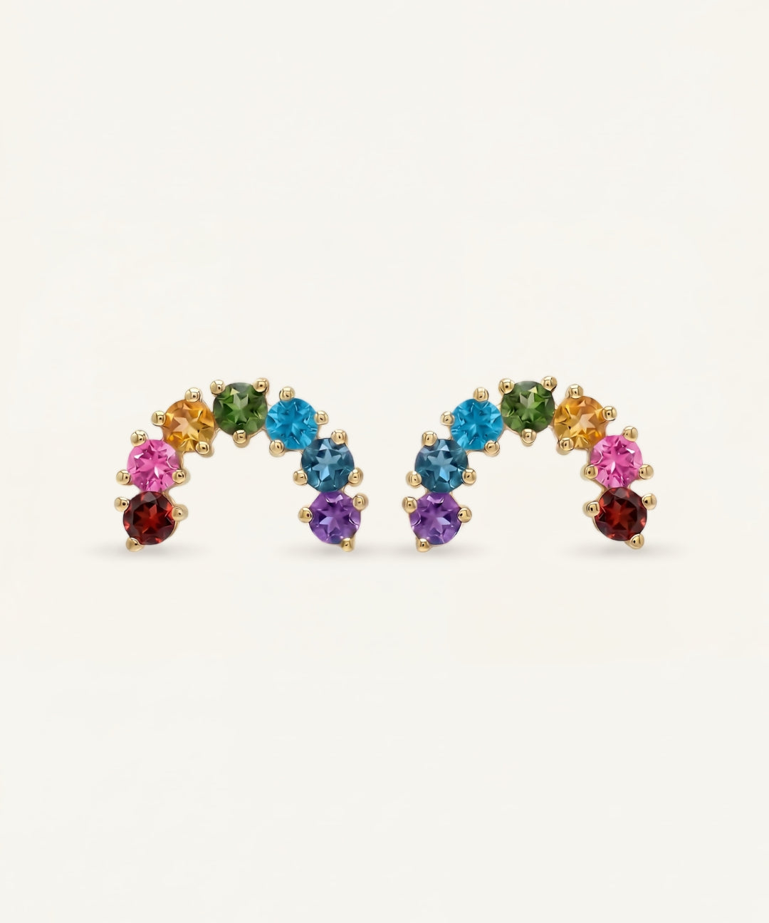 Pair of 18k gold vermeil over the rainbow arc studs featuring seven natural round-cut color gradient gemstones.