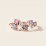 Painter’s Palette Ring in 18k Rose Gold highlighting the soft, watercolor aesthetic of the pastel moissanite arrangement.