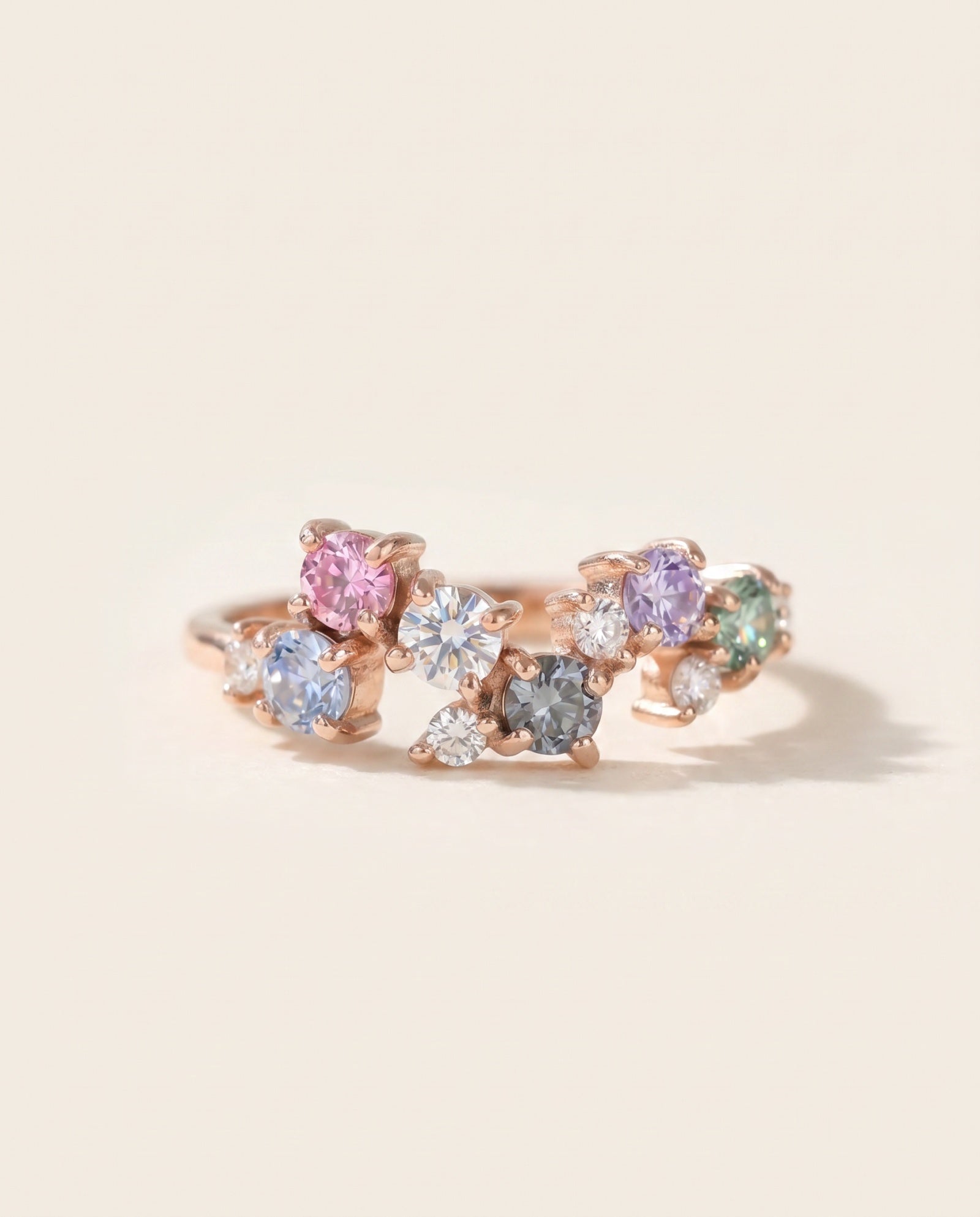 Painter’s Palette Ring in 18k Rose Gold highlighting the soft, watercolor aesthetic of the pastel moissanite arrangement.
