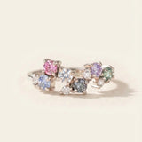 Painter’s Palette Ring in Rhodium-plated Silver showing the ethereal, rainbow sparkle of the multi-stone moissanite cluster.