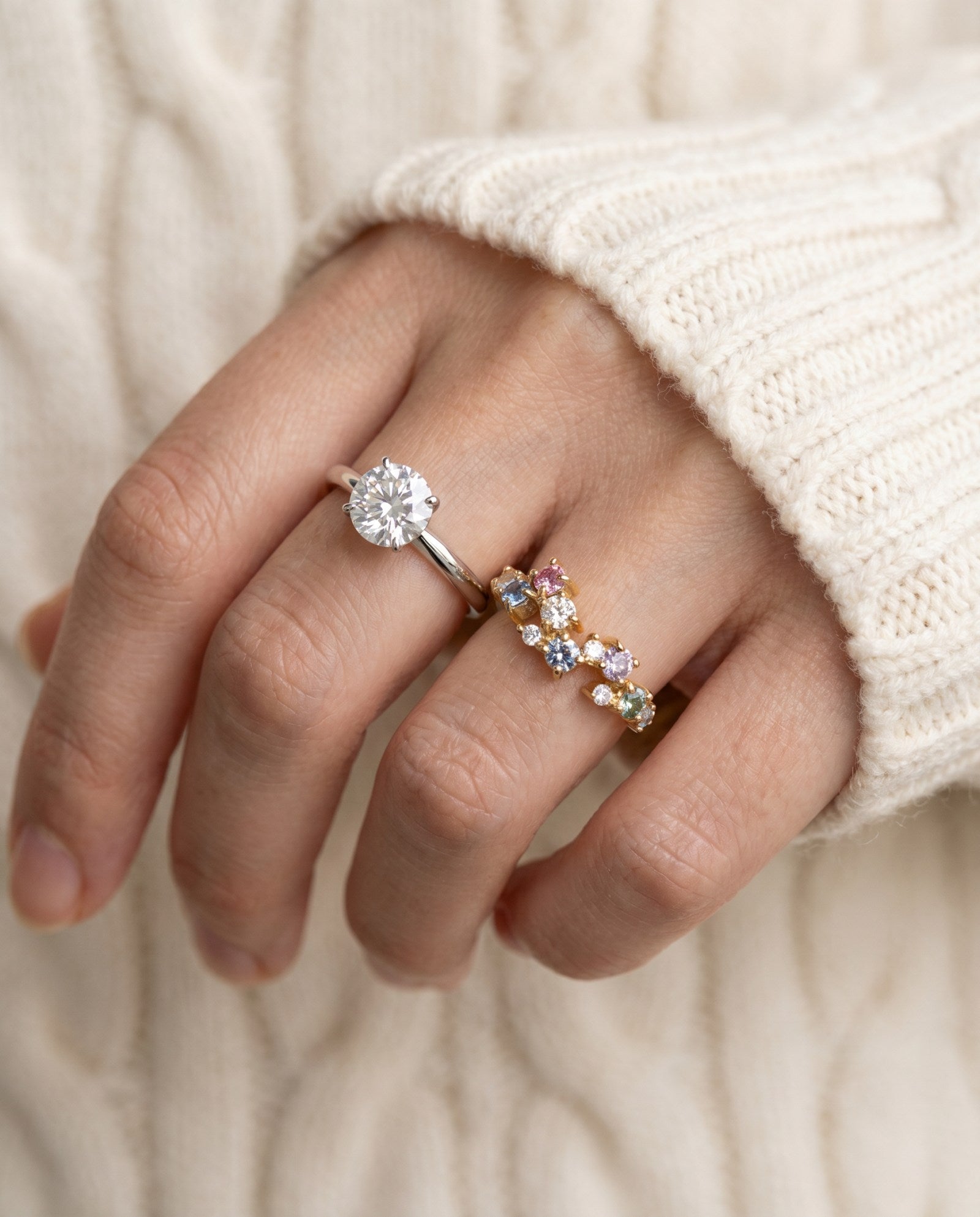 Painter’s Palette Ring in Yellow Gold stacked with a moissanite solitaire, showing a creative and colorful engagement ring style.