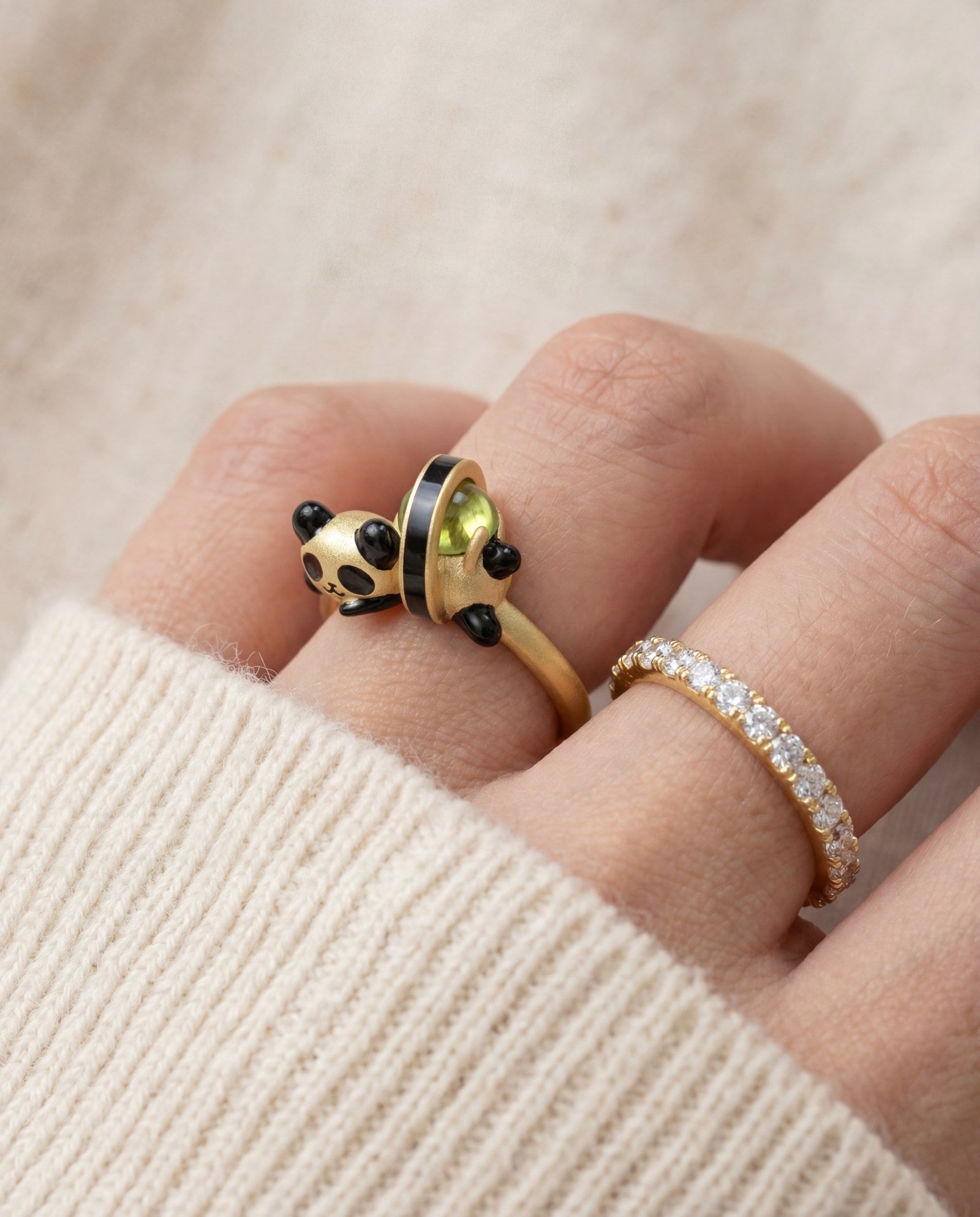 Panda Sushi Roll Ring (Peridot) in yellow gold, worn on a model