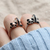 Panda Sushi Roll Ring (White Jade) in silver and rose gold, worn on a model