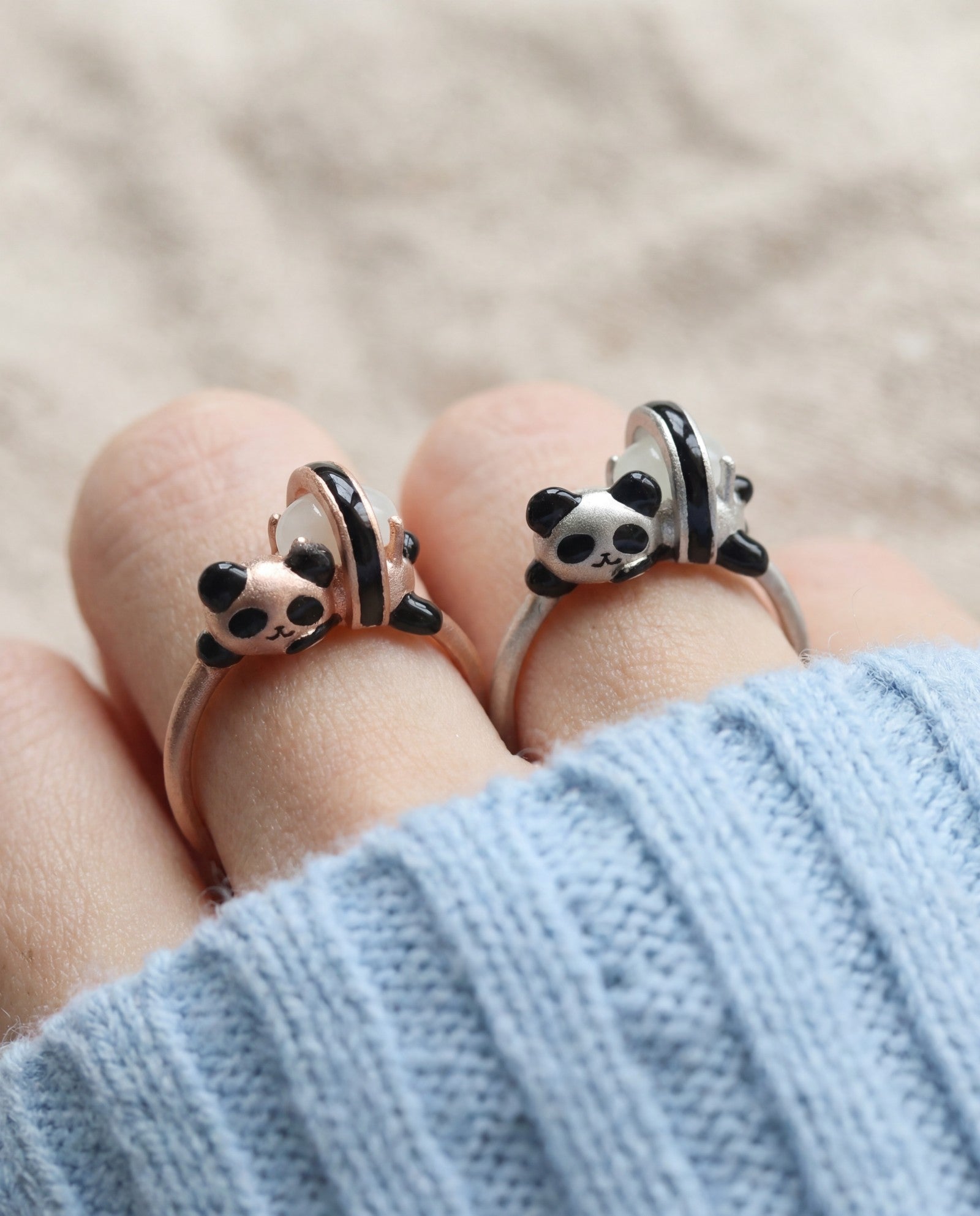 Panda Sushi Roll Ring (White Jade) in silver and rose gold, worn on a model
