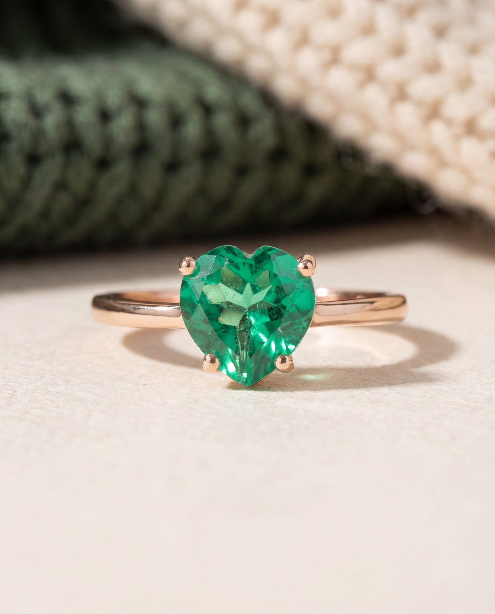 Paraiba Topaz Heart Ring | XL in rose gold, laid flat on a tabletop