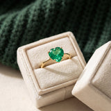 Paraiba Topaz Heart Ring | XL in yellow gold, laid flat on a tabletop
